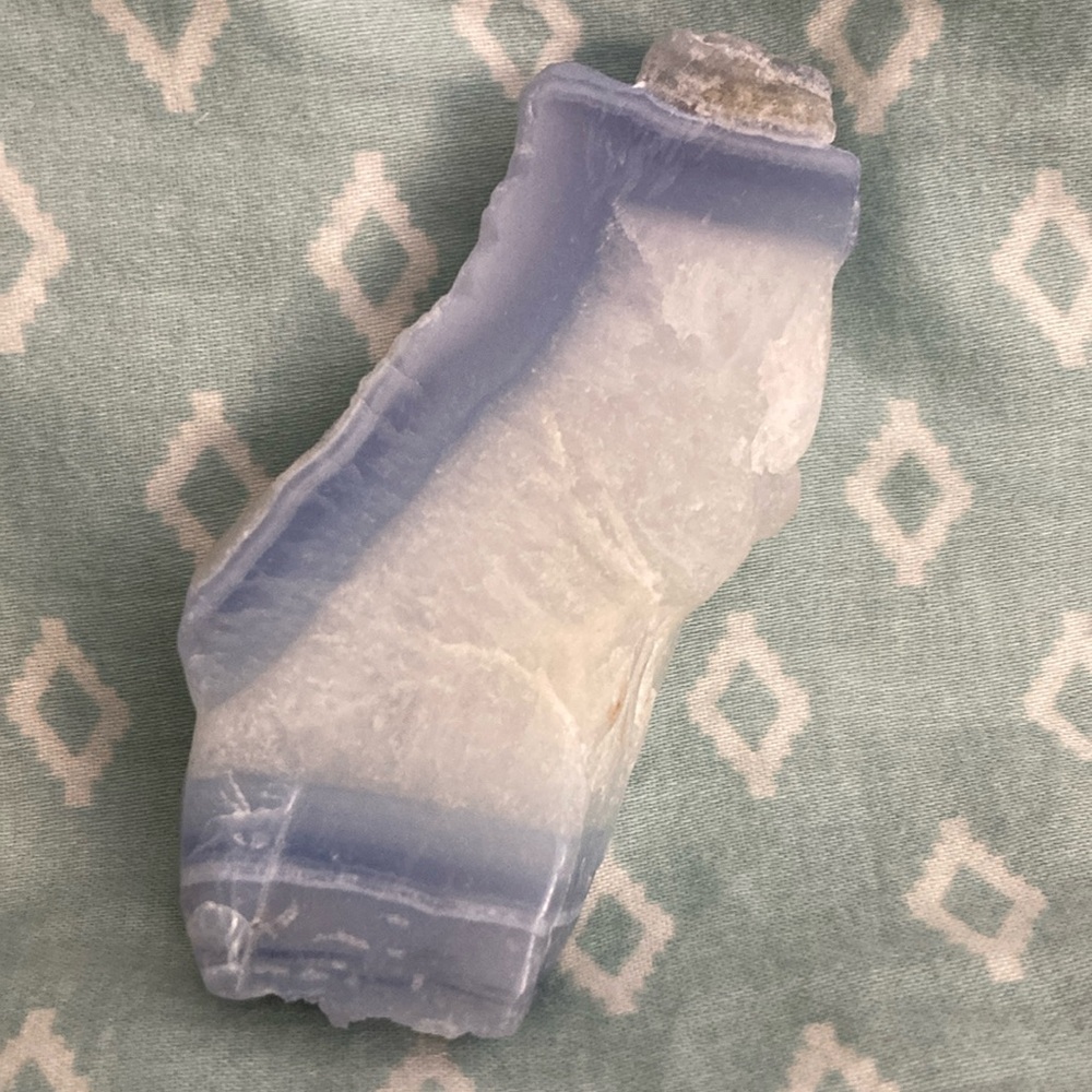 Blue Lace Agate. NWOT. 3 1/2” Long x 1 1/2” Wide. Crystal and blue banding.